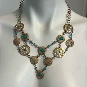 Necklace with gold and blue beads